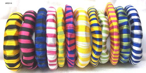 Manufacturers Exporters and Wholesale Suppliers of Thread Wooden Bangles New Delhi Delhi